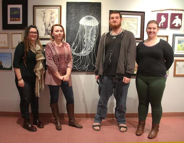 Members of the CBU Art Gallery Society Kayla Cormier, Savannah Anderson, Matthew Penney, and Kasy Benoit during installation of the CBU Art Gallery’s community exhibition, ProletariART 2015: The People’s Exhibit - photo: CBU