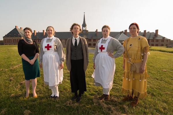 The cast of “Katharine’s Island” (Jenn Tubrett, Lindsay Thompson, Sandy Anthony, Kathleen O’Toole, and Maura Lea Morykot) pose in front of The King’s Bastion. The play about Cape Breton philanthropist Katharine McLennan runs every Wednesday night in July and August at the Fortress of Louisbourg National Historic Site - photo: Chris Walzak