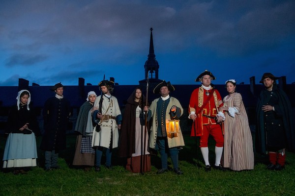 The cast of Eric Letcher's "The Condemned" (playing Thursdays at the Fortress of Louisbourg National Historic Site) before the murderous mayhem begins in deadly earnest. From left to right: Liz Kyte, Eric Letcher, Jenna Lahey, Rory Andrews, Lindsay Thompson, Aaron Corbett Mark Delaney, Kathleen O'Toole and Joel LeFort - photo: Chris Walzak