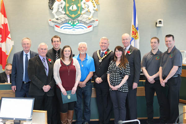 (L-R) Councilor Lowell Cormier, Councilor Kevin Saccary, Cyril MacDonald, Sarah Goode (accepting on behalf of her sister), Bill Smith, Mayor Cecil Clarke, Alexis McDonald Lamarche, Councilor Ray Paruch, Steve Fifield (Basketball Cape Breton), Greg Callahan (Basketball Cape Breton)