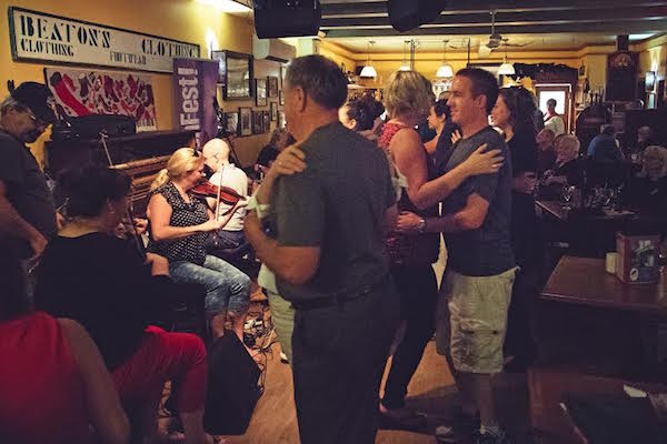 Red Shoe Pub-goers dance to Shelly Campbell, Andrea Beaton and Joel Chiasson during Kitchenfest! last year. The third annual Kitchenfest! kicks off a week of music, food and cultural events on July 2. 