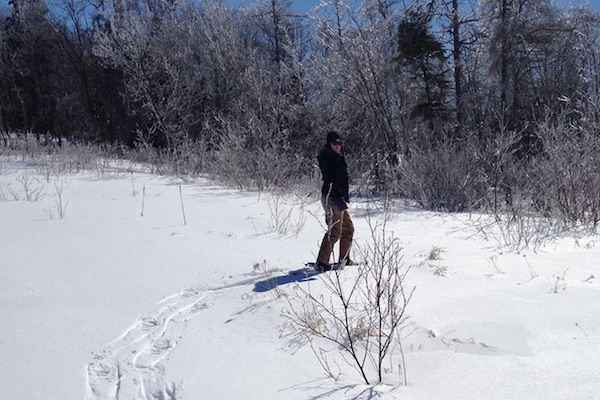 Jen Cooper, ACAP Project Coordinator, at Waterford Lake in 2015 checking out the trail for that year's annual Watershed Snowshoe Walk. This year's snow shoe hike is scheduled for February 12 at Pottle Lake in North Sydney - photo: Ashley Shelton